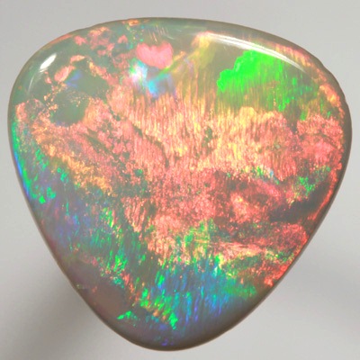 SOLID SEMI BLACK OPAL Large rolling flashes of neon red over green SEE VIDEO  